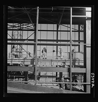 Las Vegas, Nevada. A construction scene at the Basic Magnesium Incorporated plant in the southern Nevada desert, showing workmen engaged in the steel structure of one of the chlorination plants. Sourced from the Library of Congress.