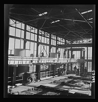 [Untitled photo, possibly related to: Las Vegas, Nevada. A construction scene at the Basic Magnesium Incorporated plant in the southern Nevada desert, showing workmen engaged in the steel structure of one of the chlorination plants]. Sourced from the Library of Congress.