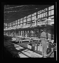 [Untitled photo, possibly related to: Las Vegas, Nevada. A construction scene at the Basic Magnesium Incorporated plant in the southern Nevada desert, showing workmen engaged in the steel structure of one of the chlorination plants]. Sourced from the Library of Congress.