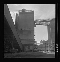 [Untitled photo, possibly related to: Las Vegas, Nevada. A giant silo and part of the buildings on the grounds of Basic Magnesium Incorporated]. Sourced from the Library of Congress.