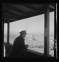 [Untitled photo, possibly related to: Las Vegas, Nevada. A view from a watchtower, showing the Basic Magnesium Incorporated plant, its 1,000 unit housing development, transmission lines and roads]. Sourced from the Library of Congress.