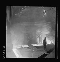 Columbia Steel Company at Ironton, Utah. Tapping a heat of iron in the cast house of the blast furnace. Sourced from the Library of Congress.
