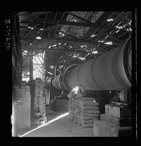 [Untitled photo, possibly related to: New Idria, California. A rotary kiln at the mercury extraction plant of the New Idria Quicksilver Mining Company. A 1200 degree Fahrenheit heat drives off the sulphur and vaporizes the mercury which is later condensed]. Sourced from the Library of Congress.