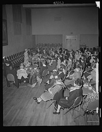 Brooklyn, New York. A woman speaker addressing the church women at the community house of the Church of the Good Shepherd. Sourced from the Library of Congress.