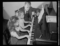 Brooklyn, New York. Mr. Haite giving a music lesson at the Church of the Good Shepherd. Sourced from the Library of Congress.
