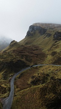Mountain mobile wallpaper background, misty Quiraing on the Isle of Skye in Scotland