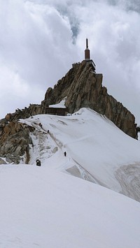 Winter iPhone wallpaper background, Rocky Aiguille du Midi covered in snow