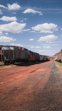 Nature mobile wallpaper background, rusty trains on a rail yard in Utah, USA