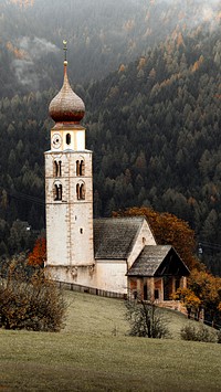 Nature phone wallpaper background, church by the forest in Italy