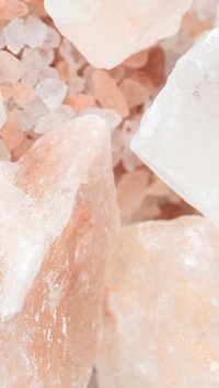 Mobile wallpaper background, coarse pink Himalayan salt crystal rocks