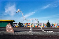 Dino skeleton view 2, Flintstone's Bedrock City, Rts. 64 and 180, Valle, Arizona (1987) photography in high resolution by John Margolies. Original from the Library of Congress. Digitally enhanced by rawpixel.