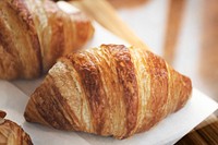 Fresh baked butter croissants on display at a cafe