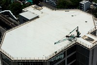 Building&#39;s rooftop helipad parking for helicopter