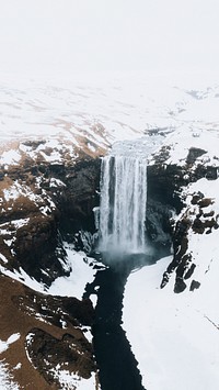 Nature phone wallpaper background, Skogafoss waterfall in the wintertime, Iceland