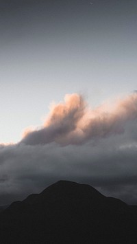 Nature iPhone wallpaper background, cloudy sky over a mountain range