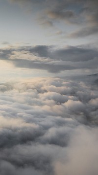 Nature mobile wallpaper background, cloudy sky over mountains background