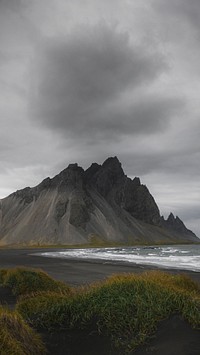 Mountain mobile wallpaper background, misty Iceland's south shore