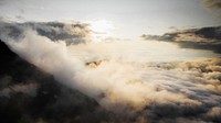 Nature desktop wallpaper background, cloudy sky over mountains