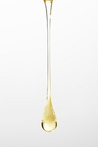 Liquid background gold dripping oil beauty product