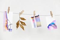 Chromatography colorful papers hanging from a rope with paper clips