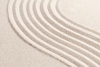 Sand wave nature textured background in wellness concept