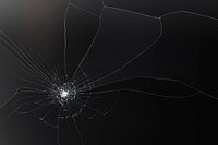 Black cracked background with broken glass texture