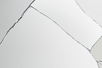 Gray background with cracked glass texture