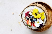 Flat lay fruits and grains in coconut shell tropical vibes 