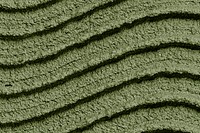 Moss green wall paint textured background