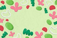 Kids clay patterned frame on green textured background creative craft for kids