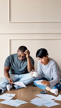 Stressed couple figuring out their finances