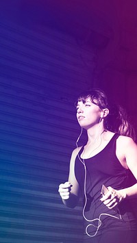 American woman jogging while listening to music