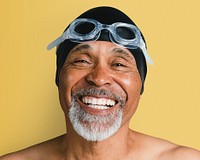 Senior man wearing swimming glasses, smiling face portrait