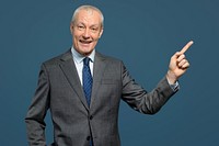 Cheerful senior businessman in a suit portrait
