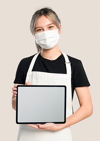 Woman holding blank tablet with design space