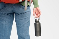 Woman holding a stainless steel water bottle