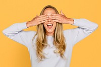 Surprised woman hands covering her eyes