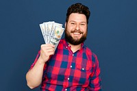 Bearded man holding dollar notes for financial savings campaign