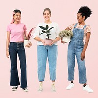 Happy women plant lovers holding potted houseplants