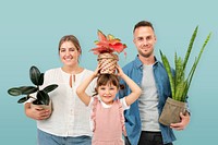 Happy family holding potted plants