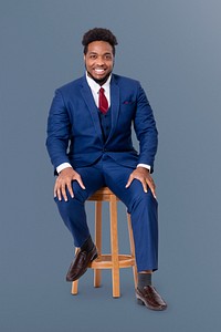 Successful businessman sitting on a wooden stool jobs and career campaign