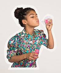 Girl blowing soap bubbles, paper texture cut out