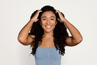 Beautiful African American woman, isolated on off white