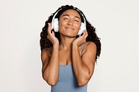 Woman wearing headphones and listening to music