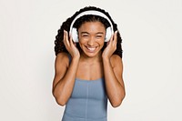 Woman wearing headphones and listening to music