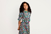 Happy little African American girl wearing a floral dress