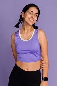 Athletic woman wearing purple sports top