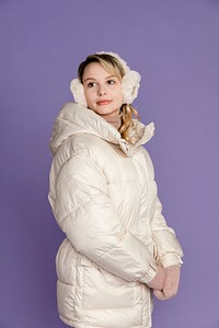 Blonde woman in white down jacket, winter outfit 