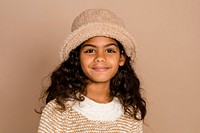 Cute girl in beige teddy hat