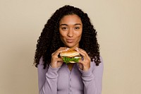 Woman enjoying a burger for lunch